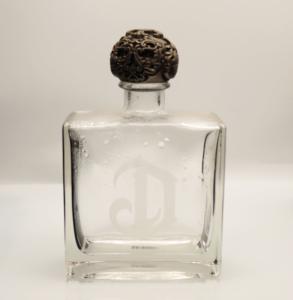 China Deleon Tequila Glass Bottle Embossed Engraving Sandblasting Glass Bottles wholesale