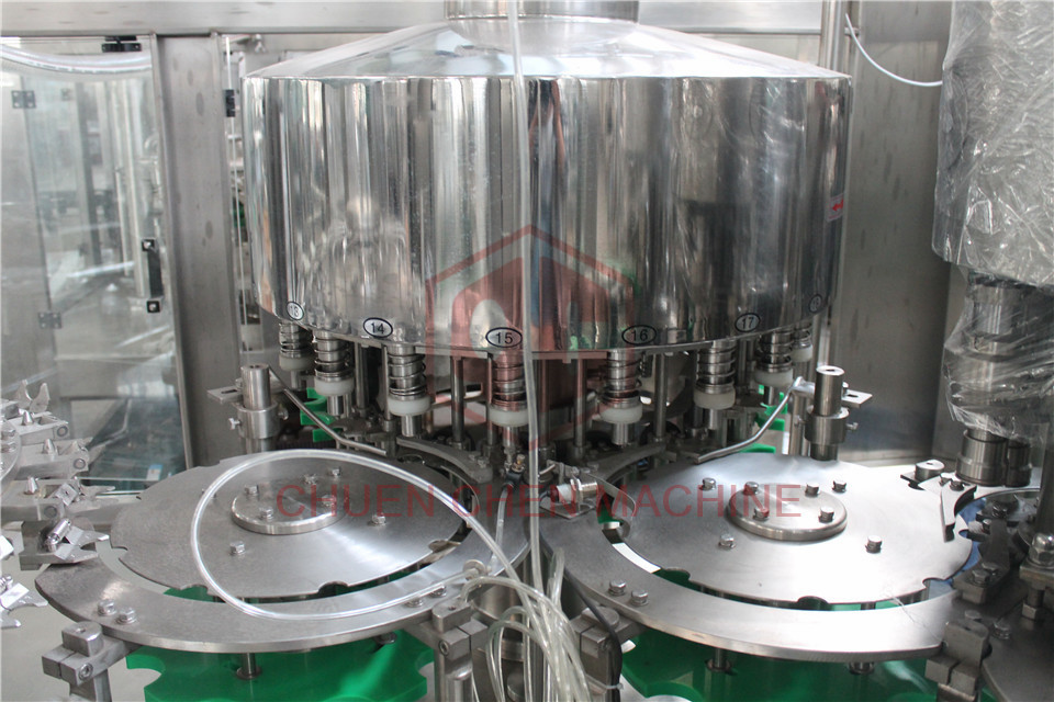 Double Head Liquid Bottle Filling Machine Rotary Volumetric Bottle
