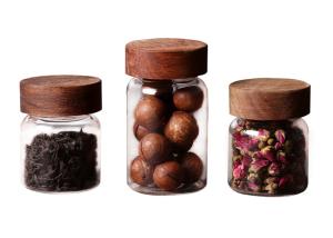 China Clear Small Coffee Canister Glass Kitchen Storage Jars With Wood Lid Round Shape wholesale