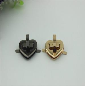 China Fashionable novelty gunmetal color heart shape bag accessories metal twist lock for handbag wholesale