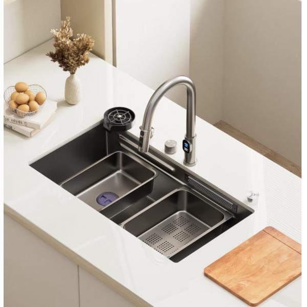 Modern stainless steel kitchen sink in contemporary kitchen setting