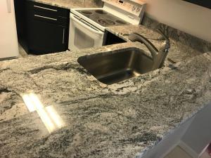 China Thickness 12mm Polished Book Match Solid Stone Countertops wholesale