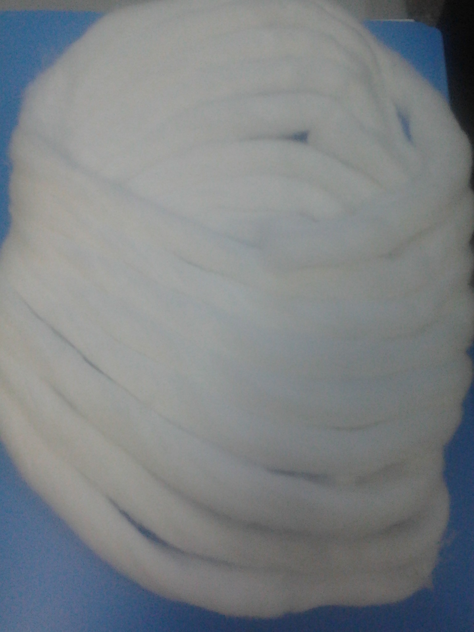 Disposable high absorbency cotton coil for making cotton ball