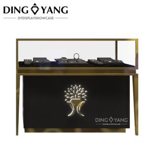 China Brush Golden Stainless Steel Custom Jewelry Showcase Match Black Wooden Storage With Lighting wholesale