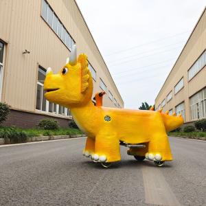 China Animatronic Dinosaur Electric Scooter , Yellow Ride On Electric Dinosaur For Theme Park wholesale