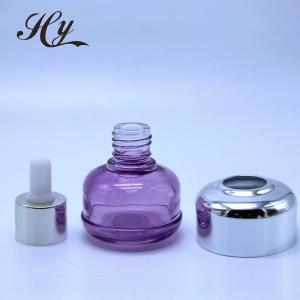 China Hanya 15ml Glass Cosmetic Dropper Bottles With Golden Press wholesale
