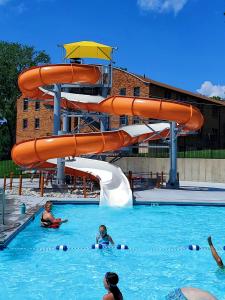 China Commercial Water Park Water Entertainment Game Orange Spiral Single Slide For Adult wholesale