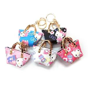 China Debossed Logo PU Leather Coin Holder Mini Handbag Keychain For Ornaments wholesale