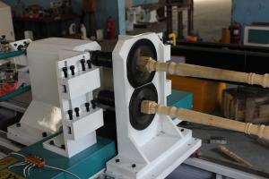 China cnc wood lathe double turning spindle cnc wood lathe wholesale