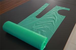 China PE Disposable Aprons On A Roll Against Liquid , Sleeveless Disposable Smocks wholesale