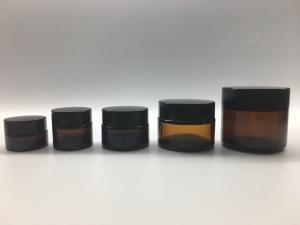 China Frosted Amber Glass Cosmetic Jars 5g 10g 120g Straight Round Shape Plastic Cap wholesale