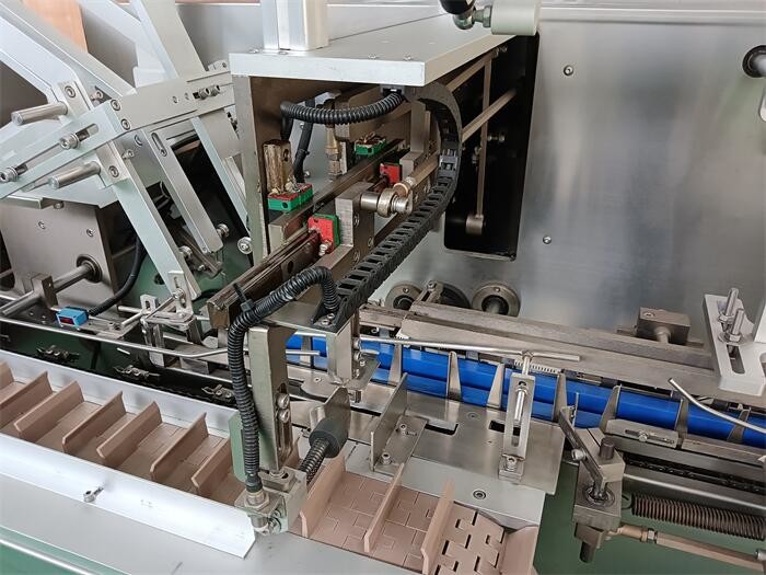 Fully Automated Pharmaceutical Packaging System for GMP Environments with PLC Control