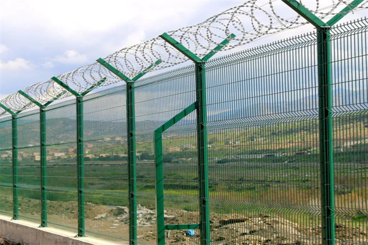 High Security Concertina Razor Wire On The Top Of Airport Perimeter Security Fencing