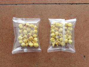 China Pop corn snacks food nitrogen filling packing machine wholesale