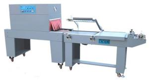China Semi Automated Packaging Machine BOPP Film Shrinking Film Wrapping Equipment wholesale