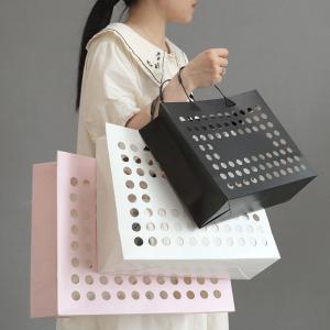 China Business Shopping Gravure Printing High End Fashion Luxury Heavy Hollow Out Paper Bags wholesale