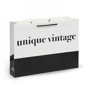 China Biodegradable Kraft Paper Bags With Handles Exquisite Gift Retail Shopping Bags wholesale