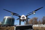 Electric Agriculture Drone with Long Distance and Liquid Contained Spraying