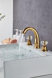 China Electroplate Double Handle Rose Gold Wash Basin Faucet wholesale