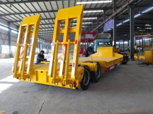 China Economic 2 Axles 40 Tons Low Bed Semi Trailer With Heavdy Duty Steel Spring Ramps wholesale