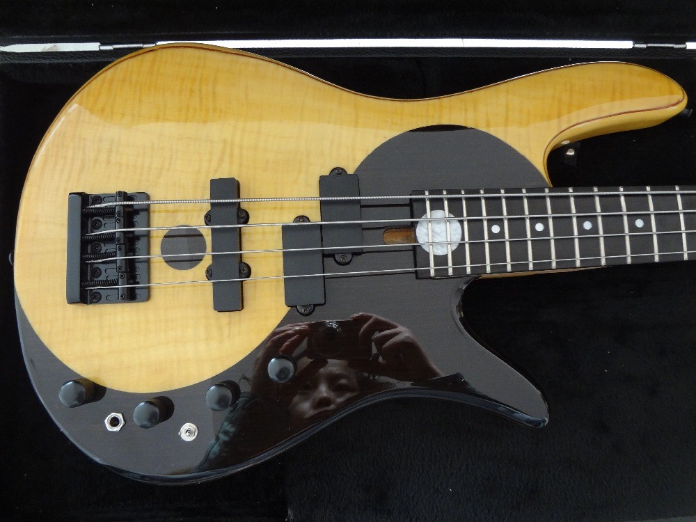 4 string bass guitar Fodera custom bass guitar Alder with flamed maple top Taiji design body MOP inlay logo