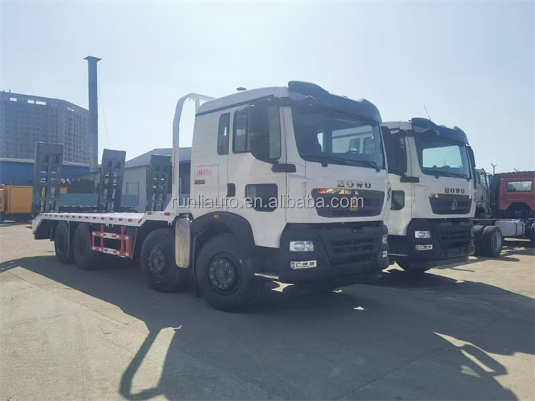 Large Capacity12 Wheels 20ton 25ton Excavator Transfer Howo Flat Bed Transport Truck