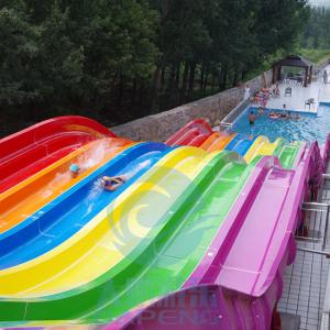 China 6 Lanes Fiberglass Mat Racer Water Slide Rainbow Racing Water Slides 10m Height wholesale