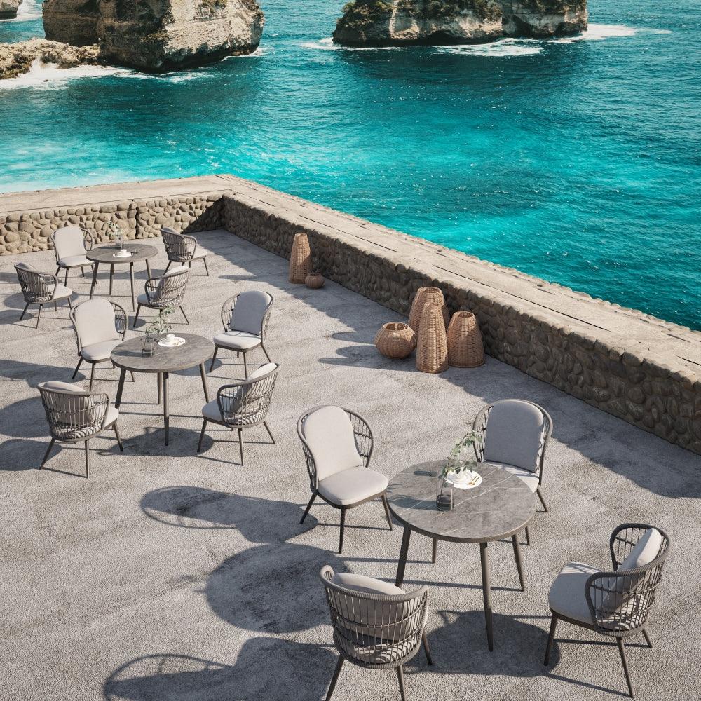 Courtyard Outdoor Dining Set with Round Tempered Glass Table and Rope Weave Armchair