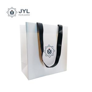 China RoHs Embossing Recycled Paper Gift Bags With Handles Antibacterial Rectangle wholesale
