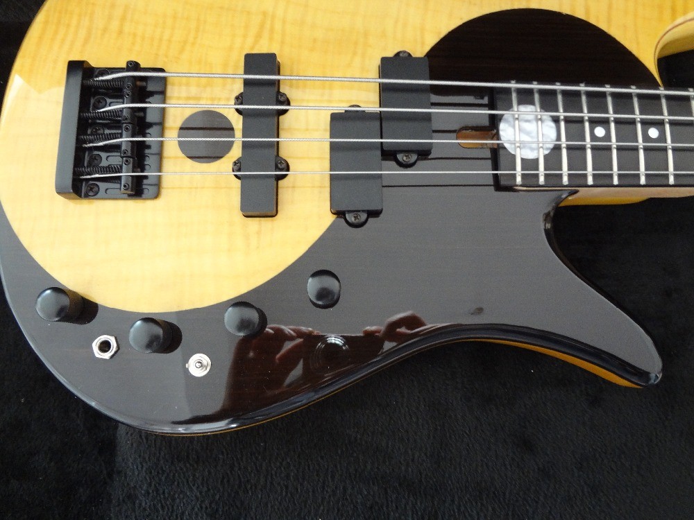 4 string bass guitar Fodera custom bass guitar Alder with flamed maple top Taiji design body MOP inlay logo