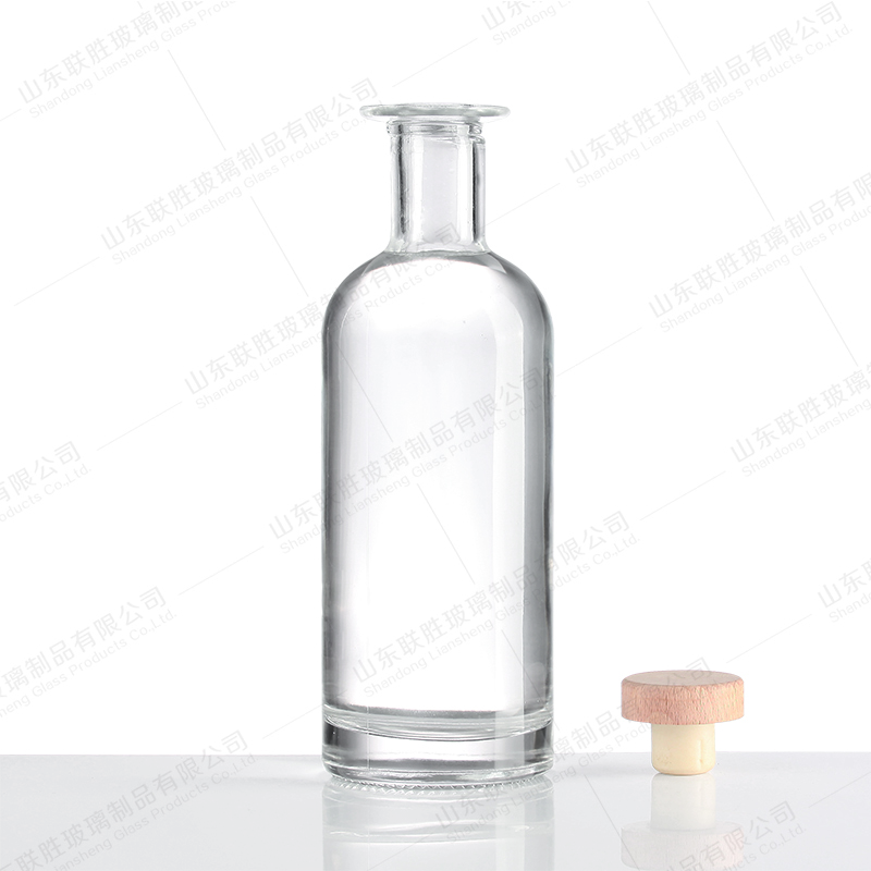 Rubber Stopper Sealing Type Custom Logo Clear Glass Bottle for Whiskey Vodka Rum Gin T Tap