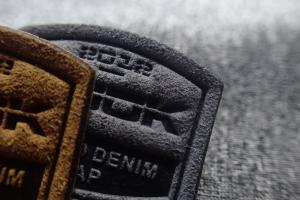 China 3D Snow Suit Micro Fiber Woven Clothing Labels Embossed Patches wholesale