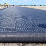 Anti Slip Geocomposite Fiberglass Geogrid Bonding PET Nonwoven Geotextile