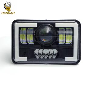 China Plastic Aluminum 5 Inch Skull White Yellow Car LED Headlights Moto Spotlight wholesale