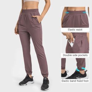 China Elastic Waist Yoga Sports Pockets Jogger Pants Women Workout Running Trouser wholesale