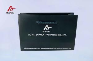 China Special Customized Extra Large Paper Shopping Bags Blue Color Embossed Logo wholesale