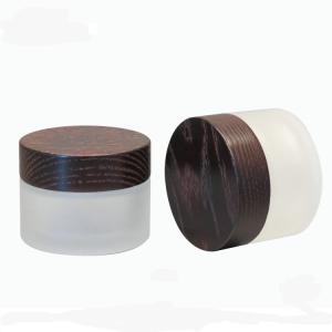 China 15g 30g 50g Oblique Shoulder Glass Cosmetic Jar With Brown Wooden Lid Cream wholesale