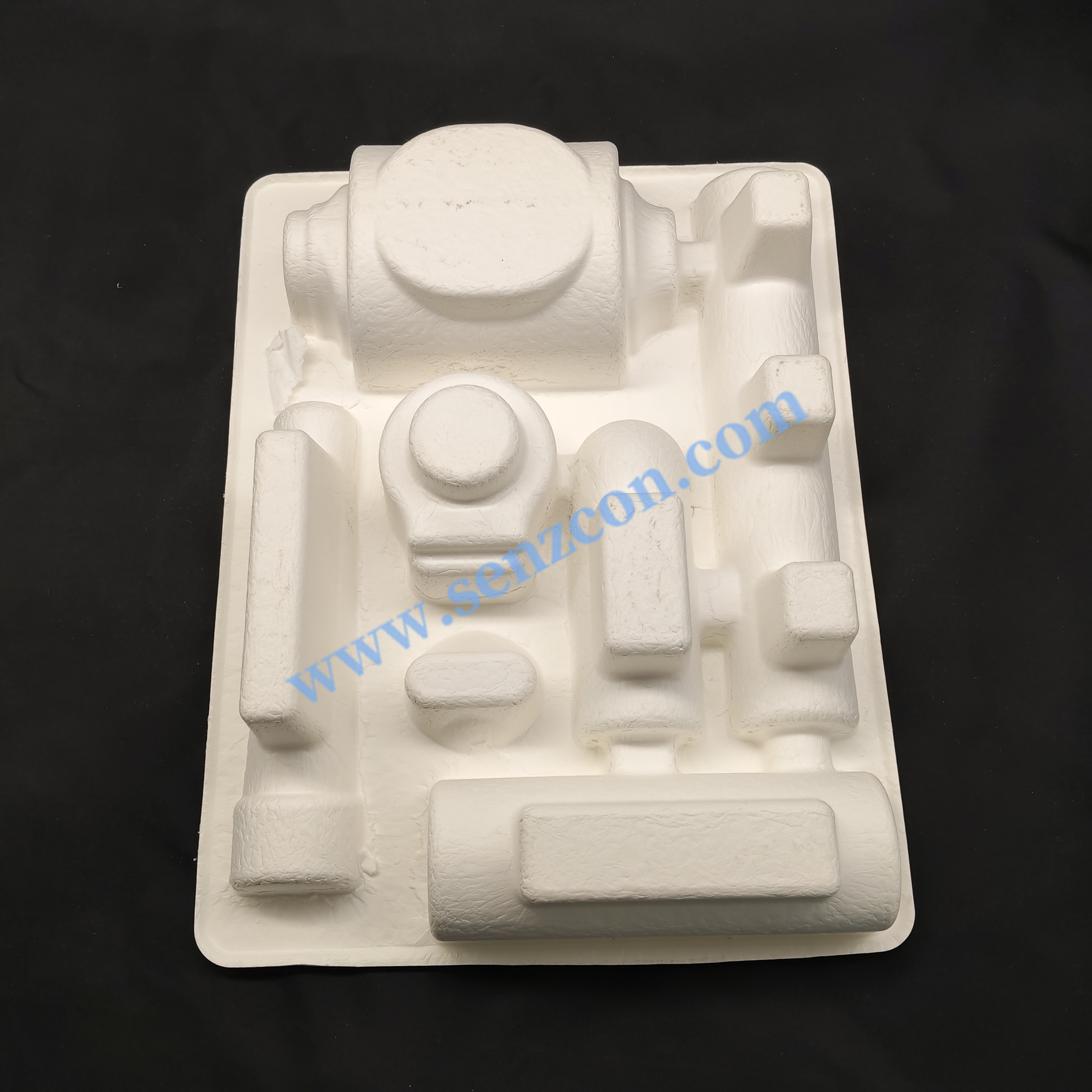 OEM eco-friendly white pulp molded packaging base for hardware accessories made from bagasse.It is a high-quality product produced by wet pressing,
