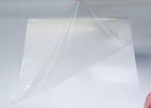 China Transparent Stretch 0.05mm Hot Melt Adhesive Film For Textile Fabric Bonding wholesale