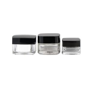 China Eco - Friendly Glass Cosmetic Cream Jar Square Shape Clear Body Black Lid wholesale