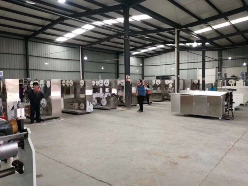 Raw Material Release Paper First Aid Plaster Making and Packing Machine KC-2000-E