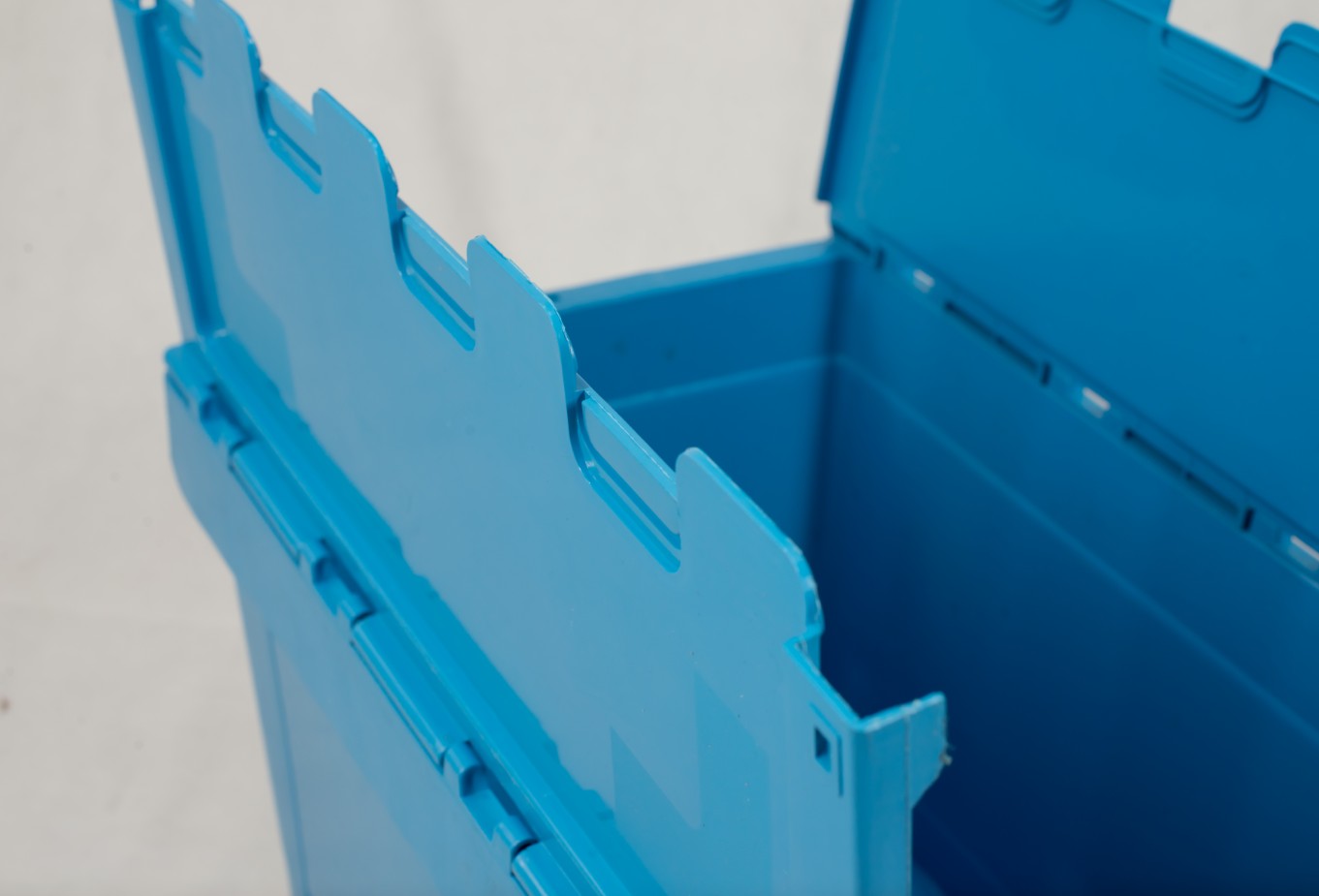 Big plastic nested and stacked storage boxes and bins