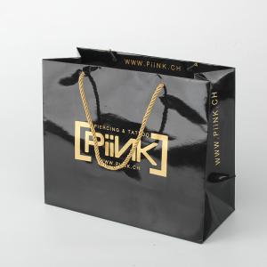 China Shiny Paper Shopping Bag Promotional Black Customize Paper Bags With Gold Foil Logo wholesale