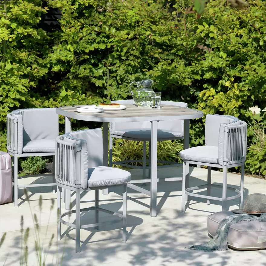 Maximize Your Outdoor Space with this Space Saving Rattan Weave and Steel Dining Set