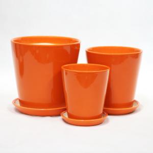 China Indoor Decor Handcrafted Orange Ceramic Pots With Drainage Holes wholesale