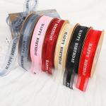 Printed letters, bows, ribbons, jacquard ribbons, packaging ribbons, clothing,