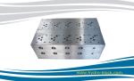 1045 steel 16 thru diameter reversing vale hydraulic manifold block