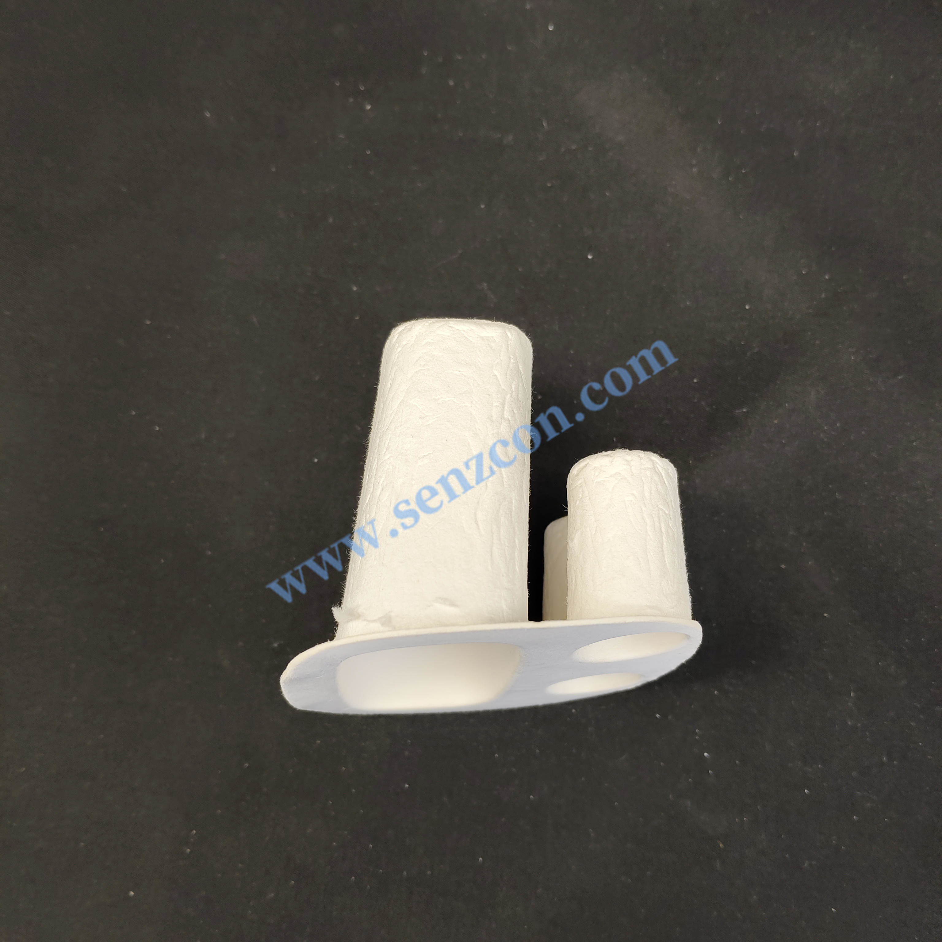 Custom-made in a Ningbo factory: Pulp molded base for electronic product earphones. Made of white plant fiber and sugarcane pulp, it is environmentall