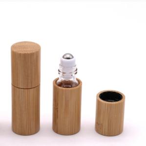 China 15ml Essential Oil Bottle Bamboo Roll On Bottle Glass With Natural Bamboo Cap wholesale