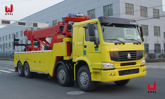 China Sinotruk 8X4 Wrecker Tow Truck 50t Yellow Heavy Vehicle Towing wholesale